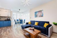 Kuchyň nebo kuchyňský kout v ubytování Apartament Porto Santa Rewales