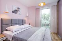 Postel nebo postele na pokoji v ubytování Apartament Porto Santa Rewales