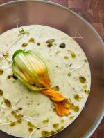 a bowl of food with an artichoke on top at Maison 1643 in Laudun