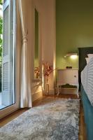 Posteľ alebo postele v izbe v ubytovaní NewVintage Apartment