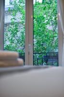 Posteľ alebo postele v izbe v ubytovaní NewVintage Apartment