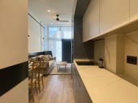 Postel nebo postele na pokoji v ubytování APARTAMENTOS ALCALA