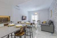 Televízia a/alebo spoločenská miestnosť v ubytovaní Living4Malaga Málaga Centre Premium