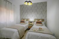 Posteľ alebo postele v izbe v ubytovaní Living4Malaga Málaga Centre Premium
