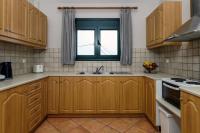 Kuchyň nebo kuchyňský kout v ubytování Koxyli Studios & Apartments