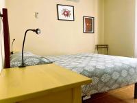 A bed or beds in a room at Antequera3