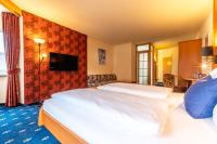 Łóżko lub łóżka w pokoju w obiekcie Hotel Tia Monte Nauders