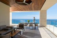 a dining room with a view of the ocean at Four Seasons Hotel in Limassol