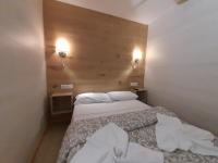 Postel nebo postele na pokoji v ubytování Benidorm Center Puerto Poniente 0