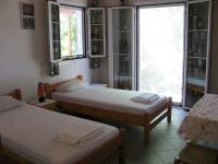 A bed or beds in a room at Nikos 9