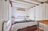 En eller flere senger p&aring; et rom p&aring; Superb 2 bedroom flat in le Marais neighborhood