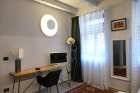 A television and/or entertainment centre at Naviglio Grande In Villa Milano