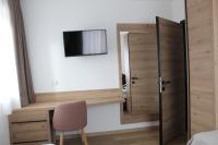 A television and/or entertainment centre at DolceAmbiez Apartments