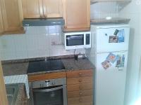 A kitchen or kitchenette at Apartamentos Navarra 07 Salou