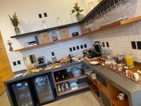 Η κουζίνα ή μικρή κουζίνα στο Hotel Pico 16