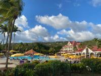 a resort with a swimming pool and a resort at Pierre et Vacances Vue Mer in Sainte-Luce