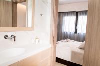 Postel nebo postele na pokoji v ubytování Lilium Apartment