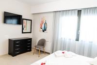 Postel nebo postele na pokoji v ubytování Lilium Apartment