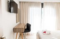 TV a/nebo společenská místnost v ubytování Lilium Apartment