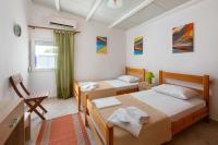 Posteľ alebo postele v izbe v ubytovaní Beach Pearl - Beach Front House with Private Pool