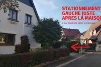 a red arrow pointing to a house on a street at Studio Marie-Rose in Ribeauvillé