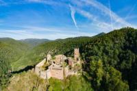 an old castle on a hill in the mountains at Studio Marie-Rose in Ribeauvillé