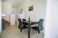 Televízia a/alebo spoločenská miestnosť v ubytovaní Apartment Nicol