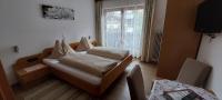Postel nebo postele na pokoji v ubytování Pension Wildental