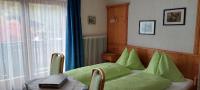 Postel nebo postele na pokoji v ubytování Pension Wildental