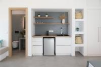 A kitchen or kitchenette at Seanfinity Beachfront Suites