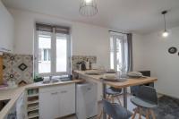 Kuchyňa alebo kuchynka v ubytovaní Appartement centre-ville