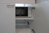 Kuchyňa alebo kuchynka v ubytovaní Appartement centre-ville