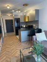 Kuchyňa alebo kuchynka v ubytovaní Apartament przy Karmelu