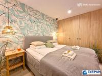 Posteľ alebo postele v izbe v ubytovaní Apartamenty w Gąskach - 365PAM