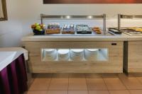 Kuchyň nebo kuchyňský kout v ubytování Hotel Viella