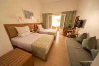 Postel nebo postele na pokoji v ubytování Dahab Lagoon Club & Resort Ex Tirana Dahab