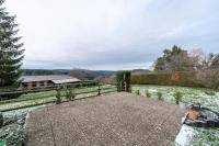 a patio with a fence and a view of the mountains at Maison de 3 chambres avec jardin clos et wifi a Dabo in Dabo