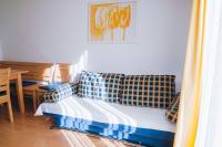 A bed or beds in a room at Landhaus Kreuz