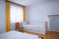 A bed or beds in a room at Landhaus Kreuz