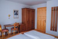 A bed or beds in a room at Landhaus Kreuz
