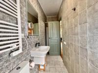 Kúpeľňa v ubytovaní Downtown apartment by United renters
