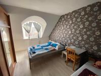 Posteľ alebo postele v izbe v ubytovaní Hermina apartmanház