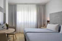 Posteľ alebo postele v izbe v ubytovaní INNSiDE by Meliá Barcelona Apolo