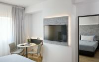 Posteľ alebo postele v izbe v ubytovaní INNSiDE by Meliá Barcelona Apolo
