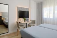 Posteľ alebo postele v izbe v ubytovaní INNSiDE by Meliá Barcelona Apolo