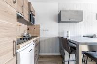 Kuchyňa alebo kuchynka v ubytovaní Charmant appartement à 500m de la plage