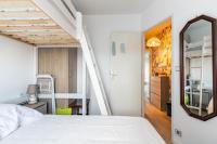 Posteľ alebo postele v izbe v ubytovaní Charmant appartement à 500m de la plage