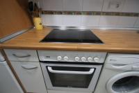 Kuchyň nebo kuchyňský kout v ubytování Apartamento Bellavista 114