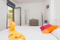 Posteľ alebo postele v izbe v ubytovaní Seaside House 4, Alcudia Beach