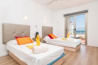 Posteľ alebo postele v izbe v ubytovaní Seaside House 4, Alcudia Beach